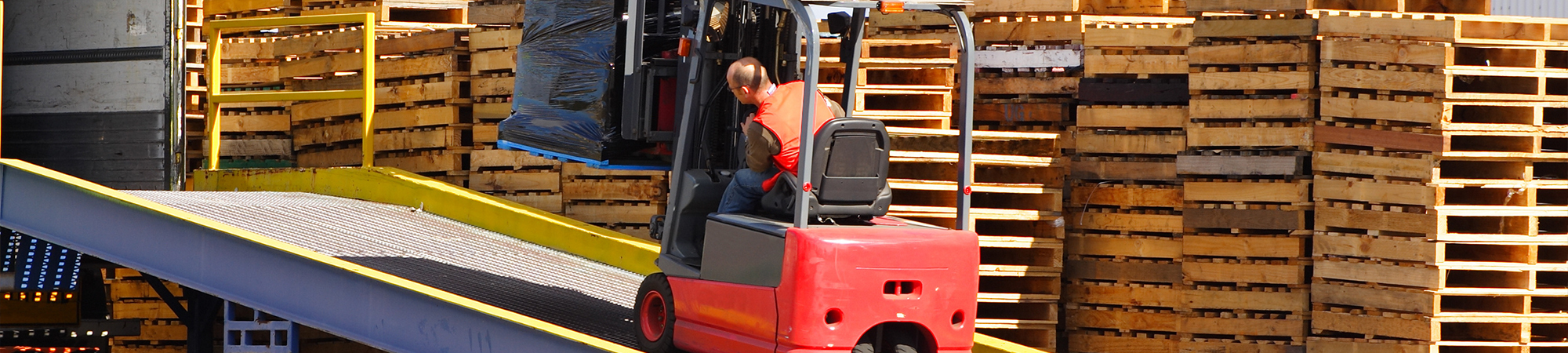 Forklift Going Into Truck
