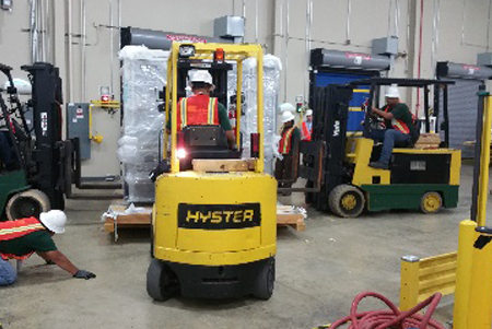 Workers in Forklifts